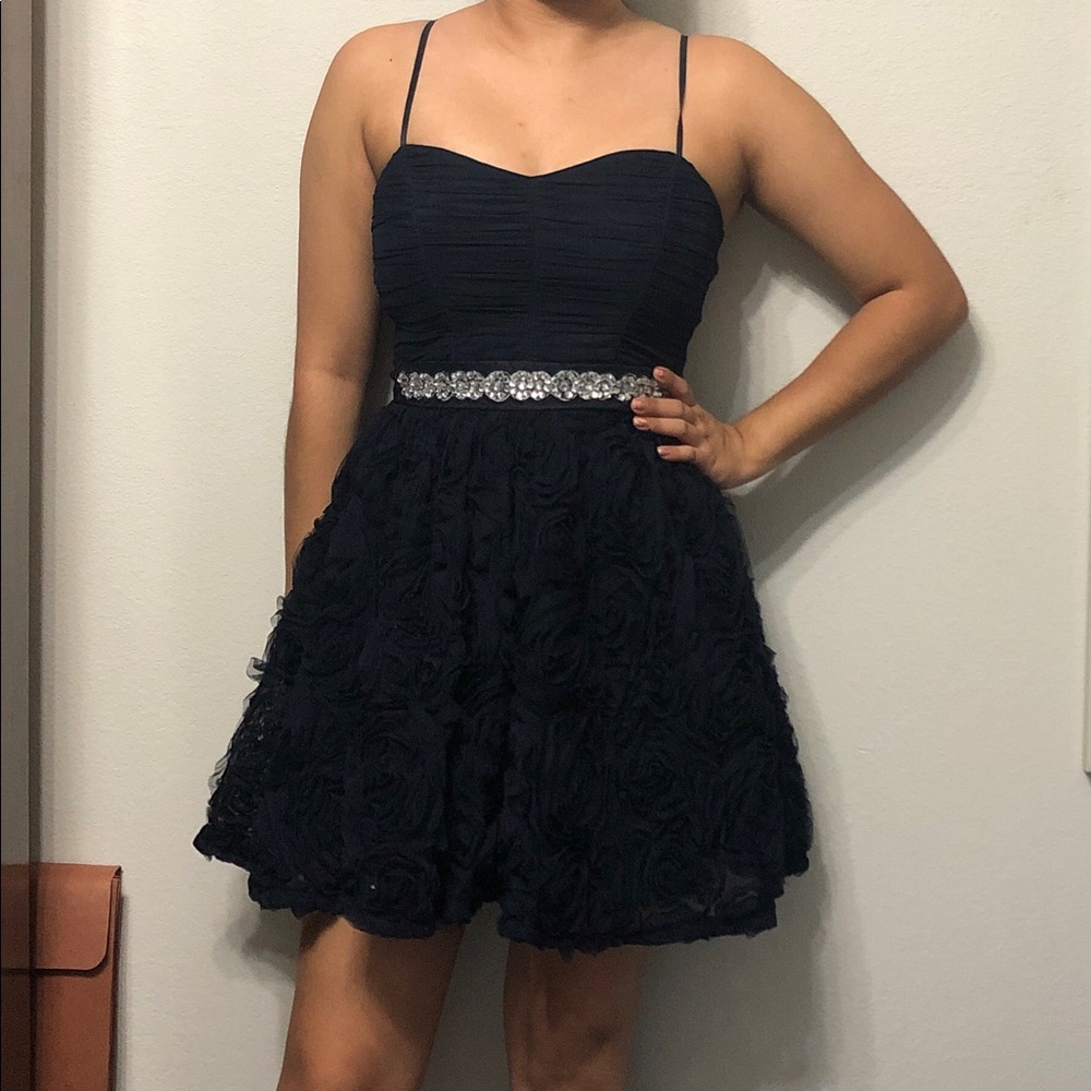 A navy sweetheart dress with straps
